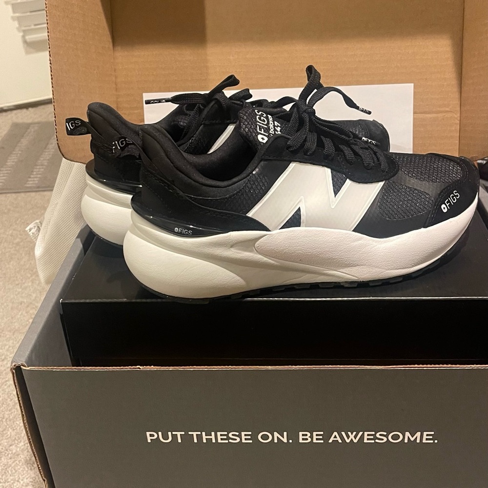 New Balance Black and White Athletic Shoes